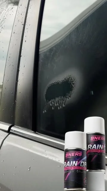 Water gliding straight off the glass with Rain Off